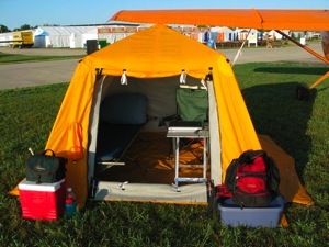 Normally camping is not allowed in Aeroshell Square; but - with the objective of exhibiting my specially built polar tent - I received permission to camp under the wing of the airplane.