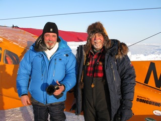 Michael Farikh with Art by the Polar Pumpkin. Michael had just flown the first R-44 helicopter from Moscow to the North Pole