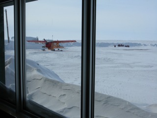 The Polar Pumpkin - waiting patiently to fly - and parked just outside the passenger terminal at Ulukhaktok, Northwest Territories airport.