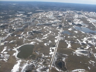 South of Swan River, Manitoba the topography transitions to mixed
